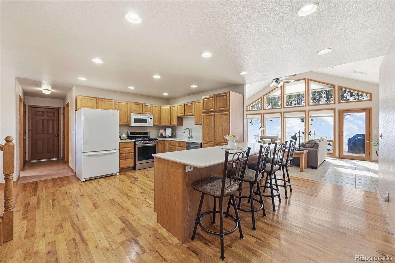 31842 Steven Way Conifer, CO 80433 - Photo 5 of 19 a kitchen with a table and chairs