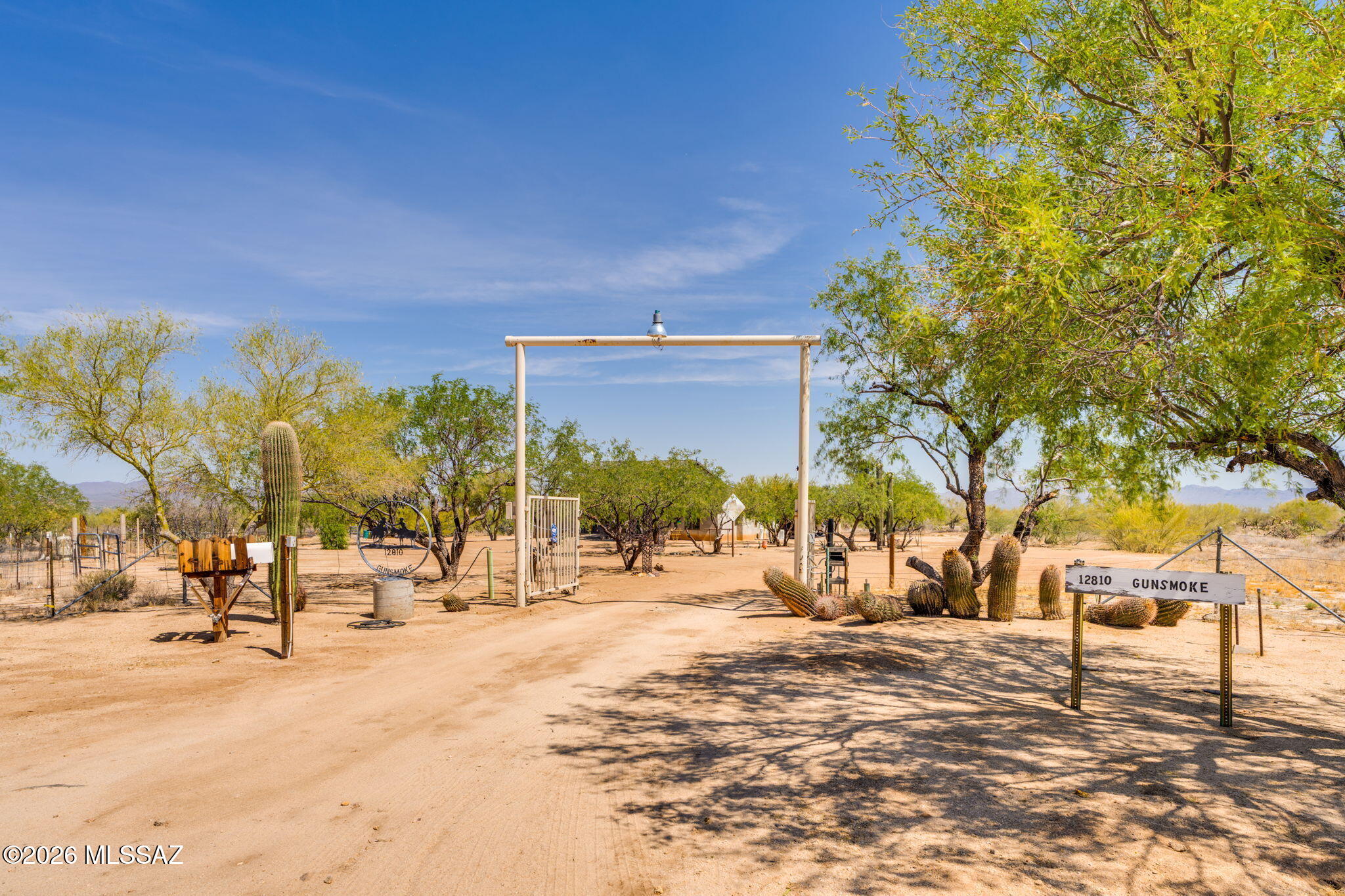 12810 West Gunsmoke Road Tucson, AZ 85736 - Photo 3 of 51 a view of a road with a building