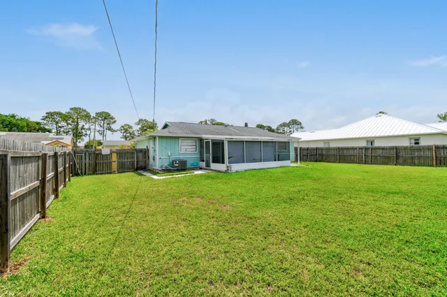 a front view of house with yard and seating