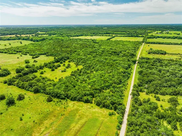 a view of a yard with an outdoor space