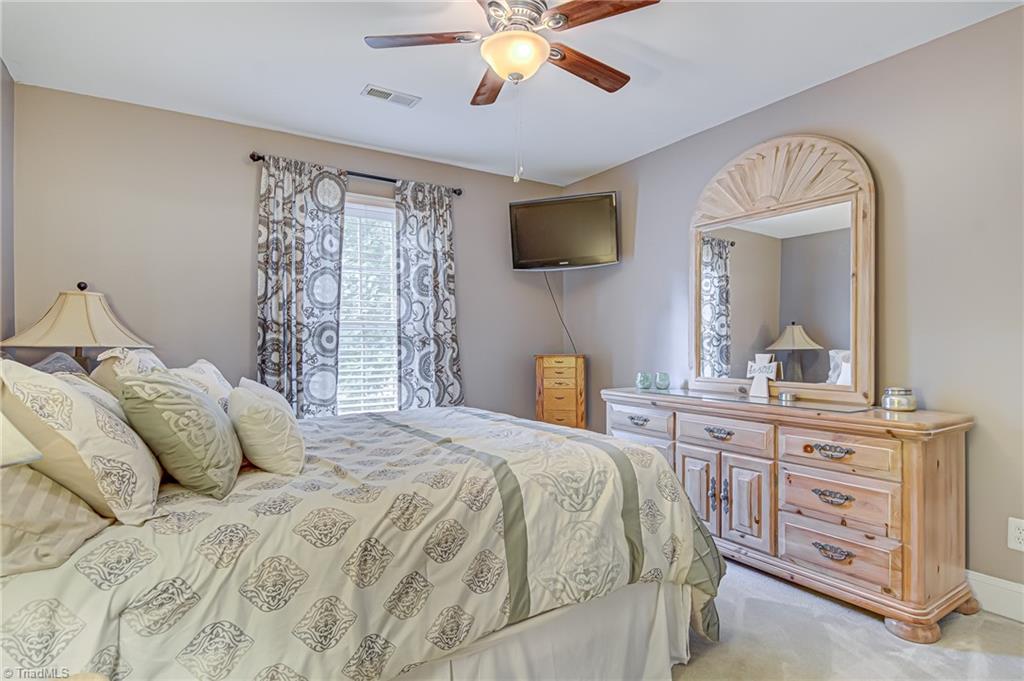 4472 Kendale Road High Point, NC 27265 - Photo 22 of 36 Good sized second bedroom with large window, closet, and ceiling fan.