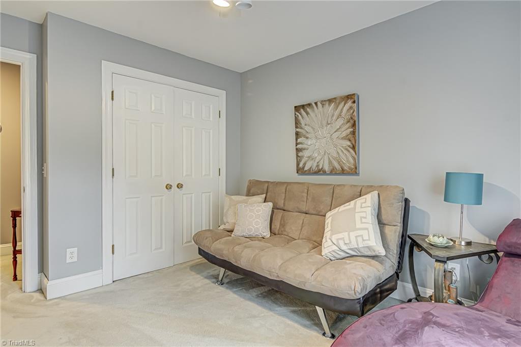 4472 Kendale Road High Point, NC 27265 - Photo 26 of 36 Third bedroom features large window, closet, and ceiling fan.