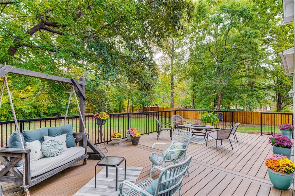 4472 Kendale Road High Point, NC 27265 - Photo 31 of 36 New deck made of low maintenance Trex-type material with beautiful large backyard and bonus nature view!