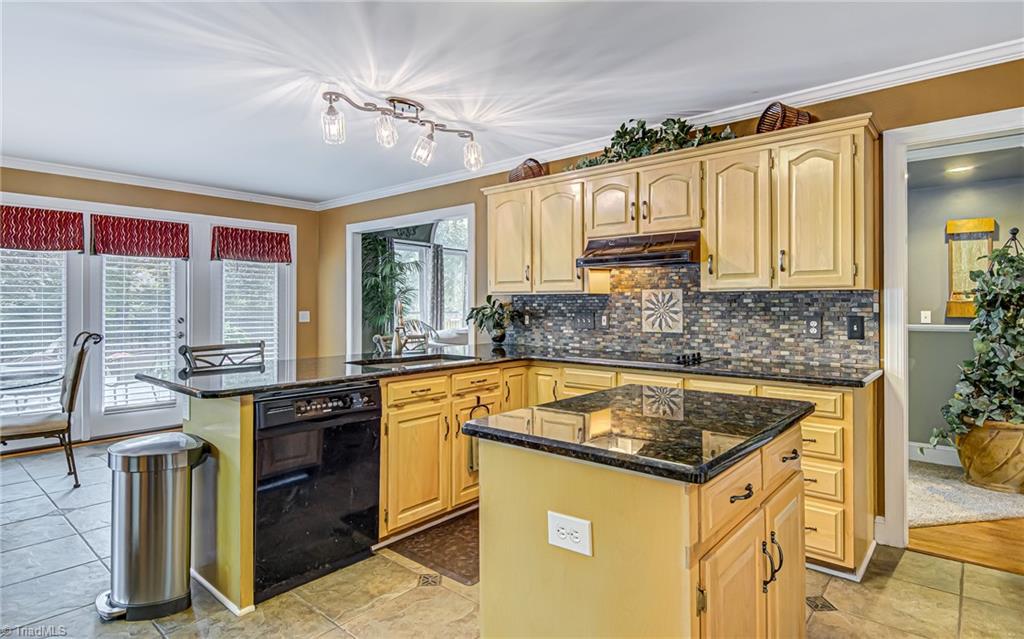 4472 Kendale Road High Point, NC 27265 - Photo 7 of 36 Kitchen is conveniently located between the living areas making food preparation a breeze!