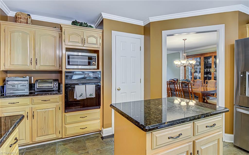 4472 Kendale Road High Point, NC 27265 - Photo 9 of 36 Good sized kitchen with an island and lots of countertop.
