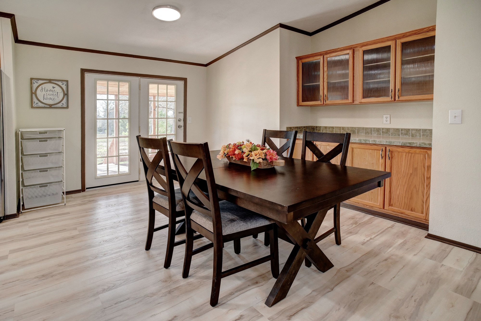 552 South Old Potato Road Paige, TX 78659 - Photo 14 of 40 Dine and enjoy the view through the French doors, or take it outside and dine on the deck. Options are nice!