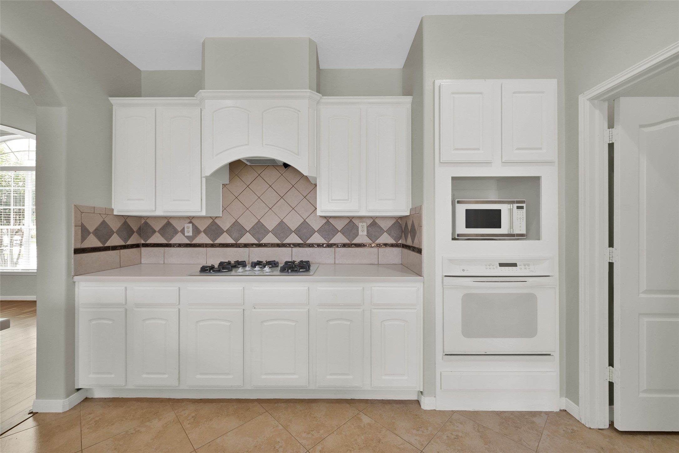 23202 Drywood Crossing Court Spring, TX 77373 - Photo 11 of 31 Kitchen with freshly painted cabinets