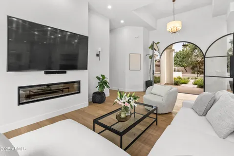 a bathroom with a sink a mirror and vanity