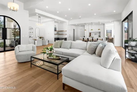 a bedroom with a bed and a couch