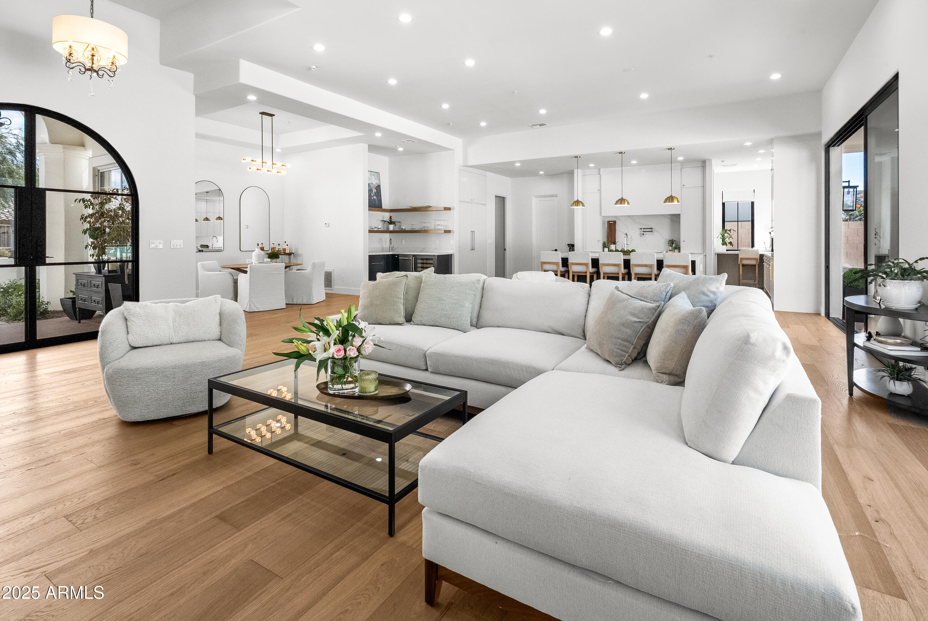 12134 East Mercer Lane Scottsdale, AZ 85259 - Photo 18 of 35 a living room with furniture and a large window