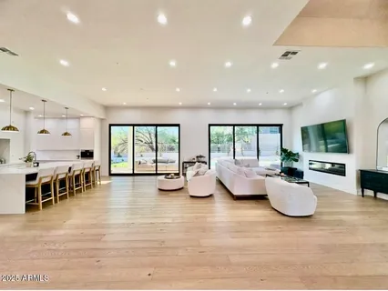 a bathroom with a double vanity sink and mirror