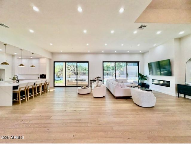 a bathroom with a double vanity sink and mirror