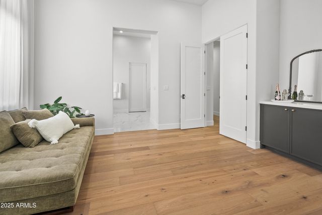 a view of a kitchen with a sink and a window