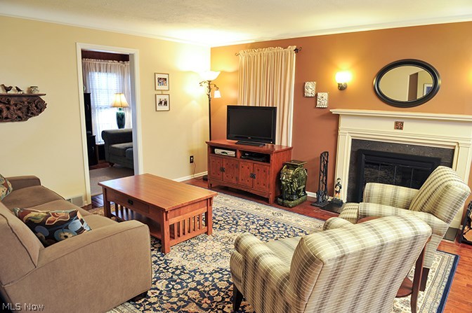 2604 Fenwick Road Cleveland, OH 44118 - Photo 2 of 19 Well lit living room leads to the cozy den.