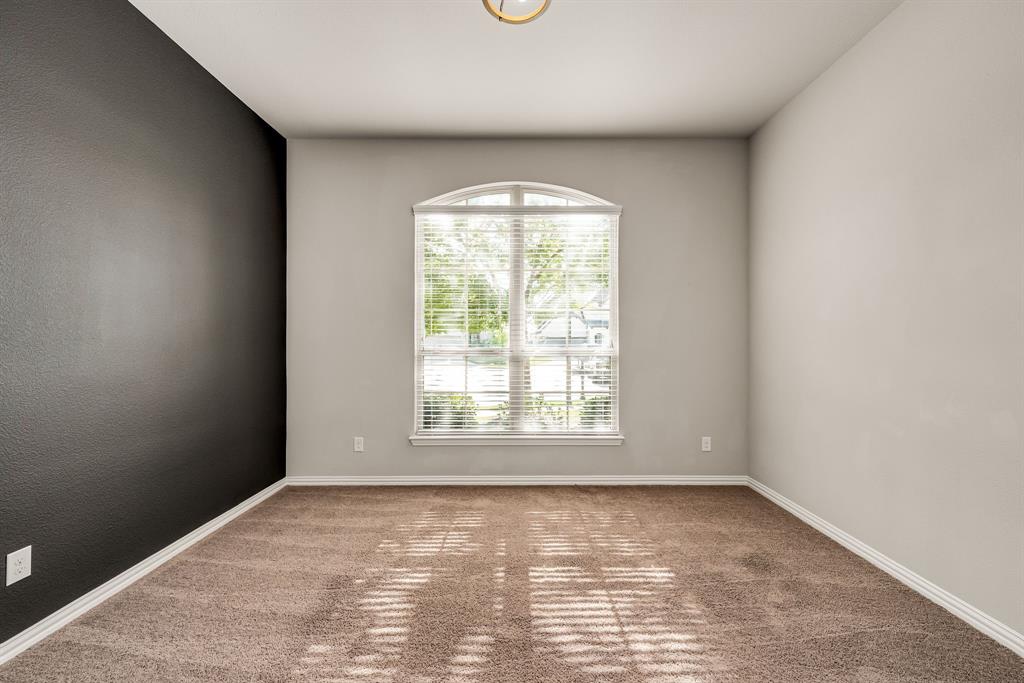 3341 Man O War Road Celina, TX 75009 - Photo 13 of 40 an empty room with a window