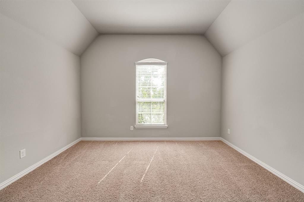 3341 Man O War Road Celina, TX 75009 - Photo 24 of 40 an empty room with a window