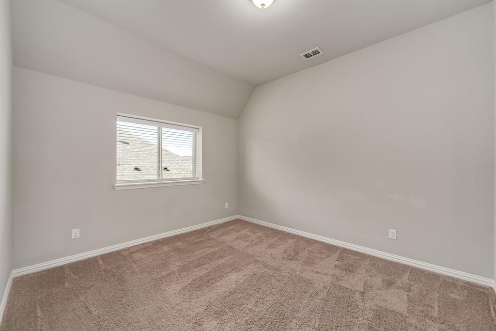 3341 Man O War Road Celina, TX 75009 - Photo 26 of 40 an empty room with windows
