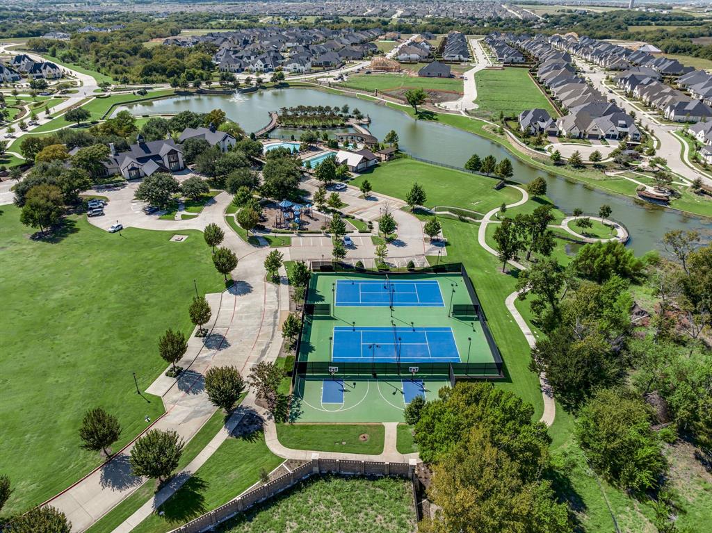 3341 Man O War Road Celina, TX 75009 - Photo 37 of 40 an aerial view of a house with a yard and lake view