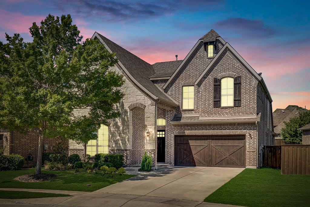 3341 Man O War Road Celina, TX 75009 - Photo 40 of 40 a front view of a house with a yard and garage