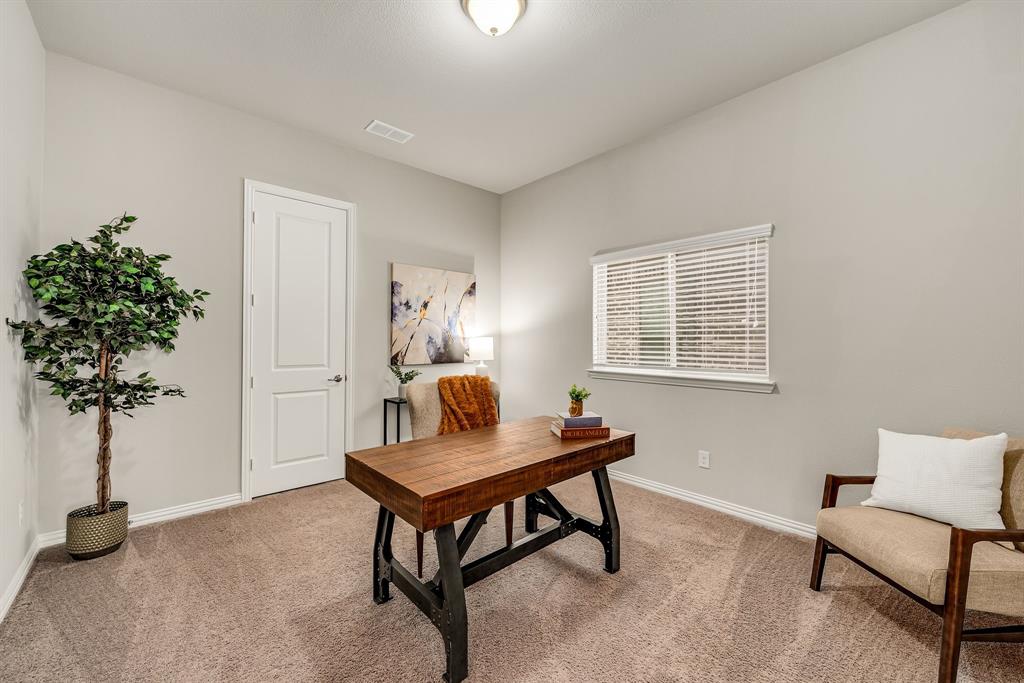 3341 Man O War Road Celina, TX 75009 - Photo 4 of 40 a workspace with furniture and a potted plant