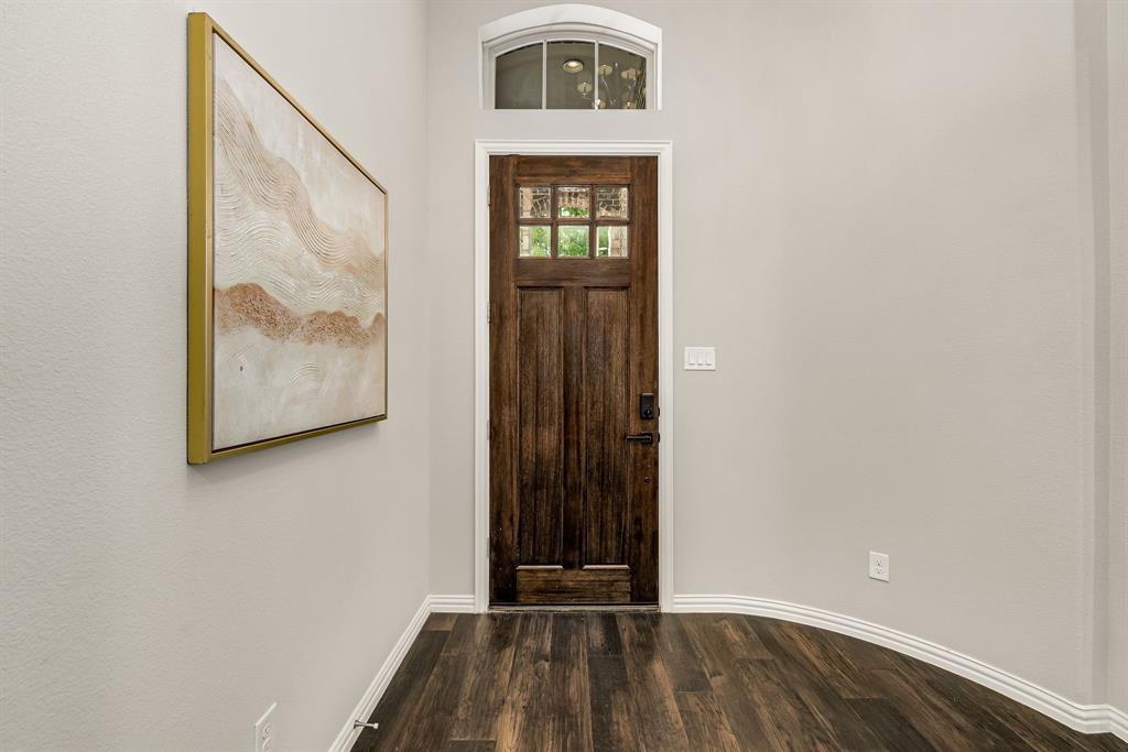 3341 Man O War Road Celina, TX 75009 - Photo 6 of 40 a view of an entryway with wooden floor