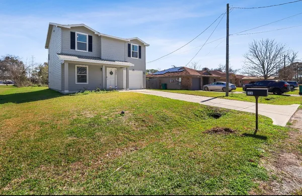 a house view with a yard