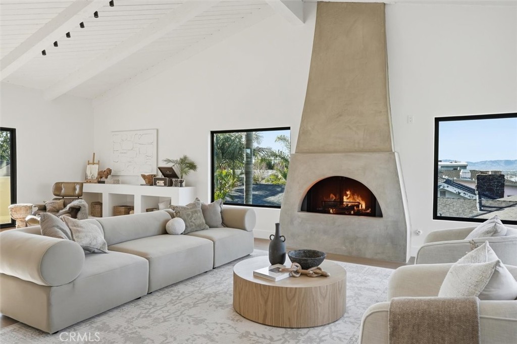 8140 Calabar Avenue Playa del Rey, CA 90293 - Photo 11 of 59 a living room with furniture and a fireplace