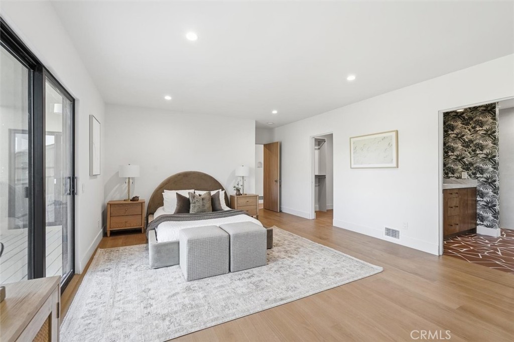 8140 Calabar Avenue Playa del Rey, CA 90293 - Photo 27 of 59 a bedroom with a large bed and a large window