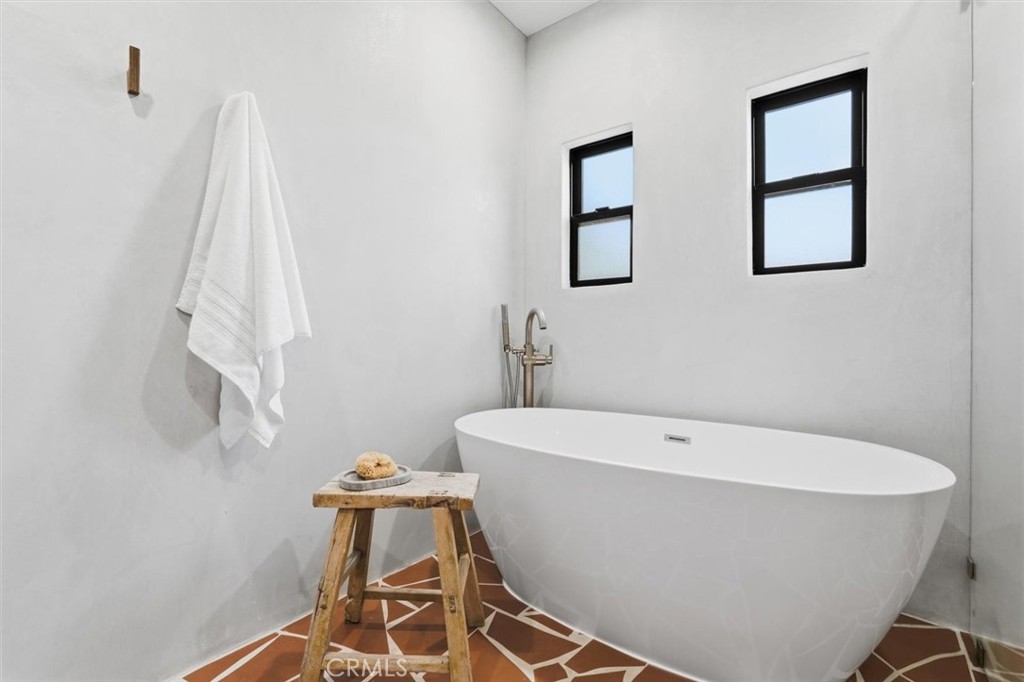 8140 Calabar Avenue Playa del Rey, CA 90293 - Photo 30 of 59 a white bath tub sitting next to a white toilet