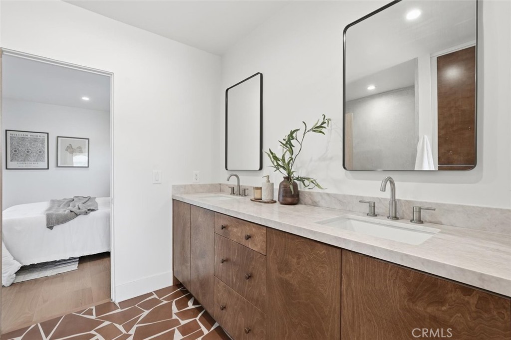8140 Calabar Avenue Playa del Rey, CA 90293 - Photo 36 of 59 a bathroom with a double vanity sink and mirror