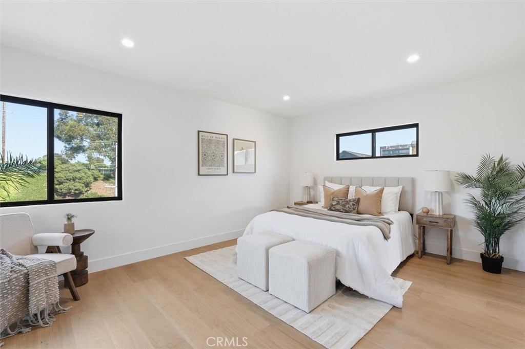 8140 Calabar Avenue Playa del Rey, CA 90293 - Photo 38 of 59 a bedroom with a bed and a large window