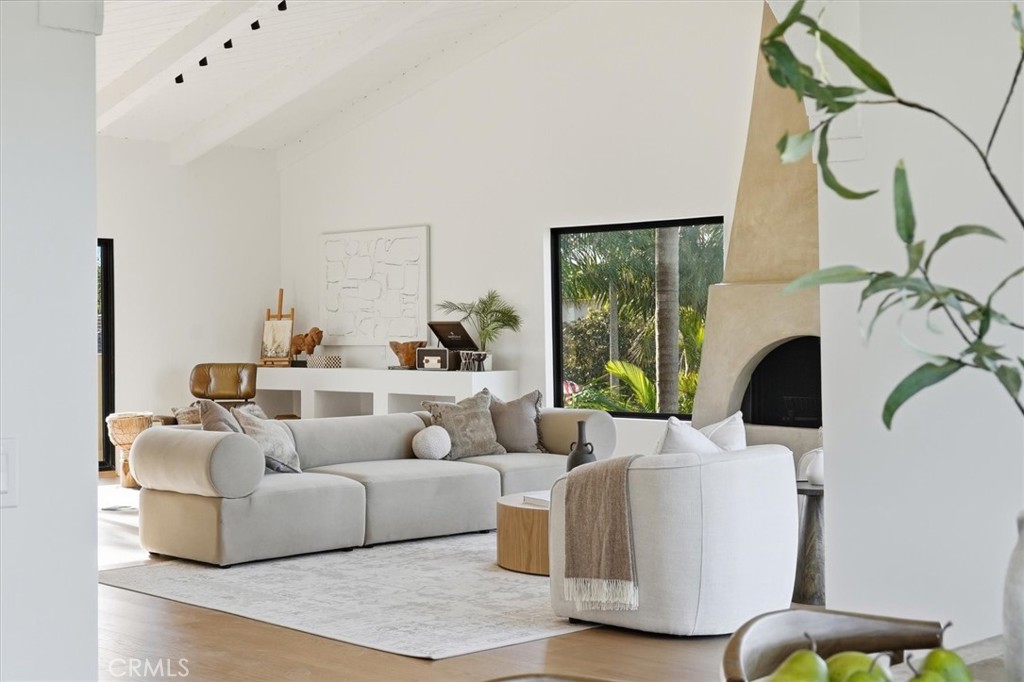 8140 Calabar Avenue Playa del Rey, CA 90293 - Photo 4 of 59 a living room with furniture a fireplace and a flat screen tv