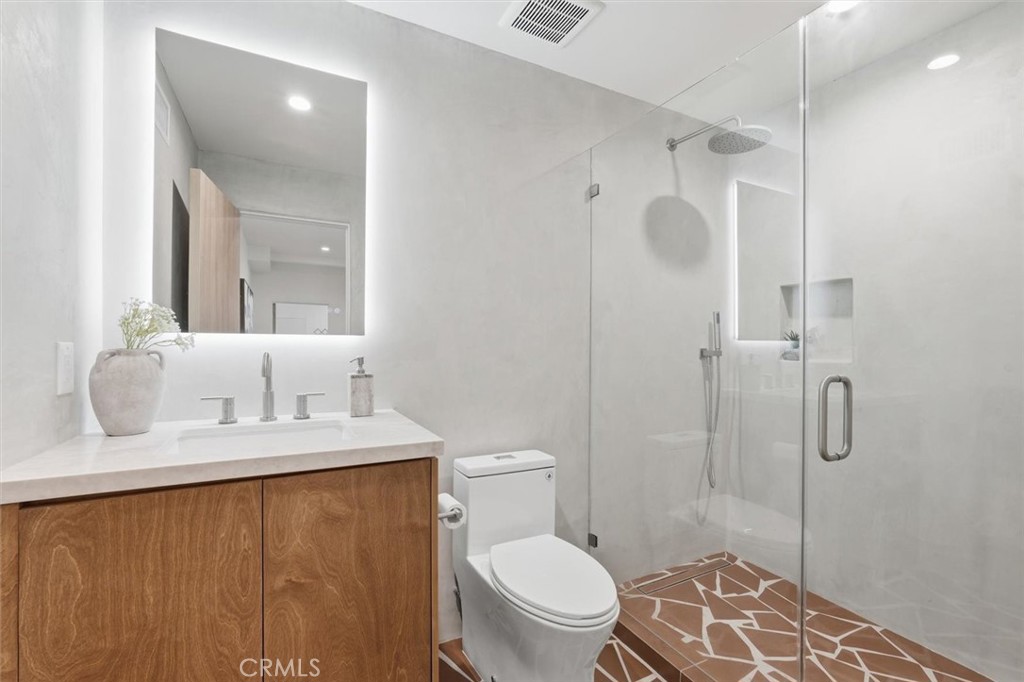8140 Calabar Avenue Playa del Rey, CA 90293 - Photo 41 of 59 a bathroom with a granite countertop sink toilet and shower