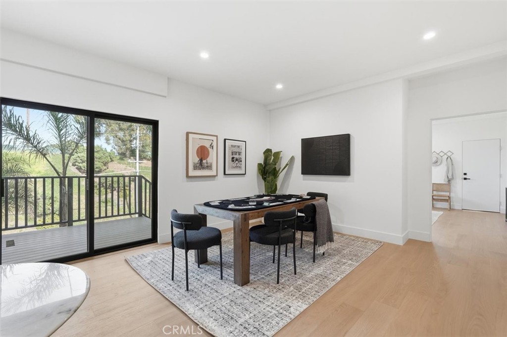 8140 Calabar Avenue Playa del Rey, CA 90293 - Photo 43 of 59 a living room with furniture a flat screen tv and a floor to ceiling window