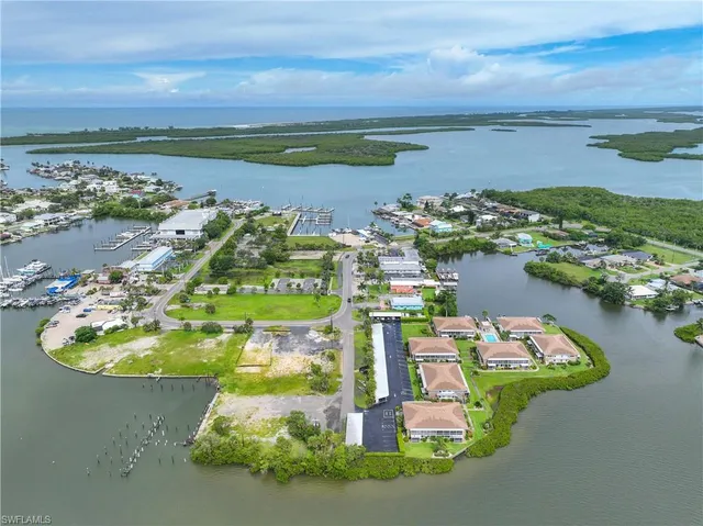 a view of a lake with a big yard