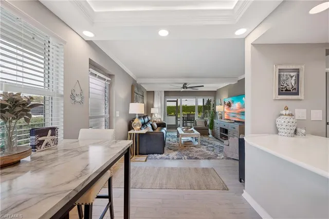 a very nice looking living room with a large window