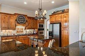 802 Pathview Court Dacula, GA 30019 - Photo 16 of 56 a view of a kitchen with granite countertop cabinets