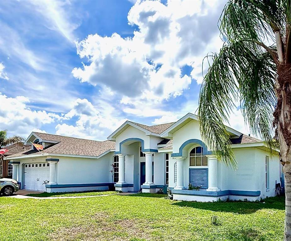 front view of house with a yard