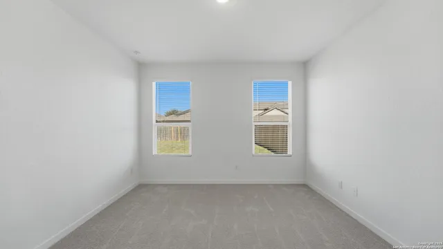 a bathroom with a double vanity sink mirror and double