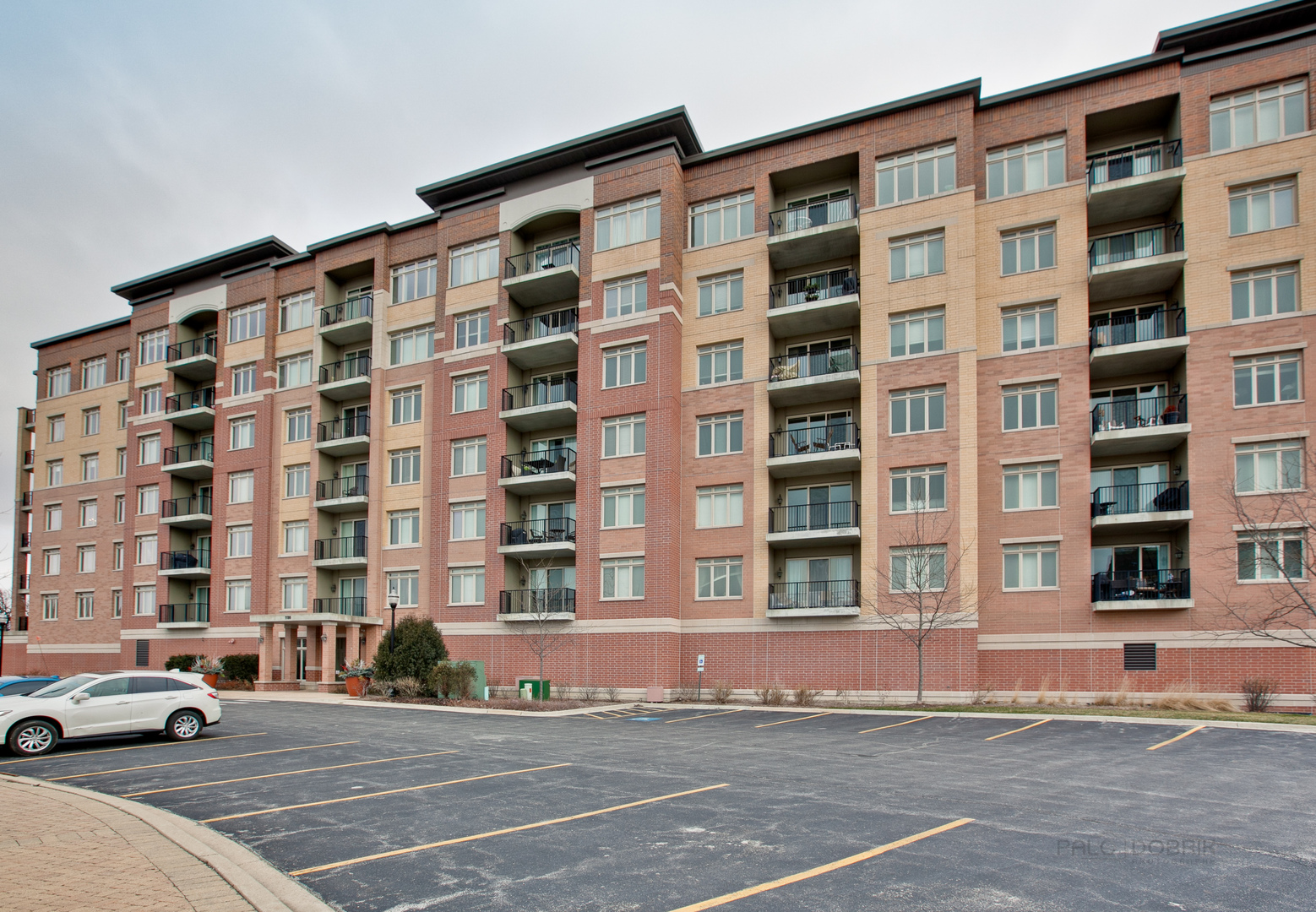 1199 East Port Clinton Road, Unit 405 Vernon Hills, IL 60061 - Photo 1 of 29 a front view of a building