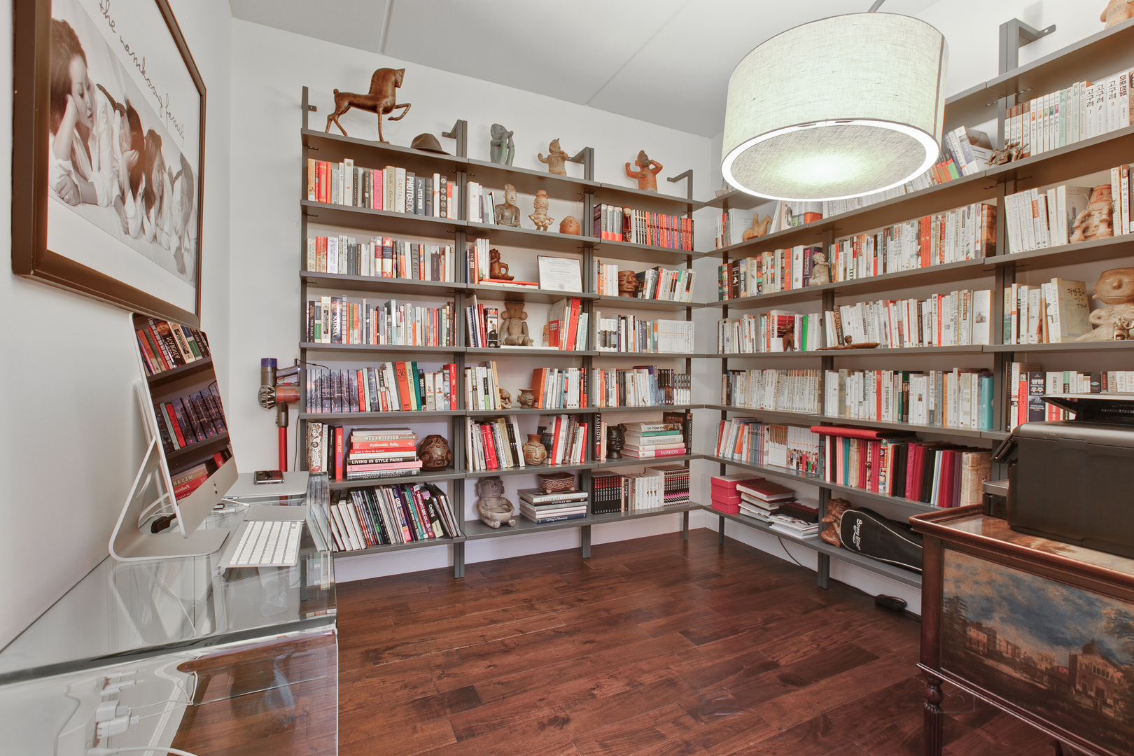 1199 East Port Clinton Road, Unit 405 Vernon Hills, IL 60061 - Photo 13 of 29 a view of a livingroom with furniture and bookshelf