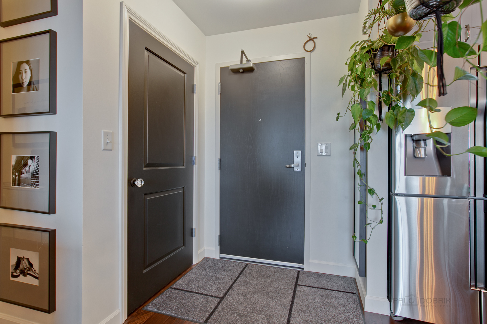 1199 East Port Clinton Road, Unit 405 Vernon Hills, IL 60061 - Photo 3 of 29 a view of entryway with wooden floor