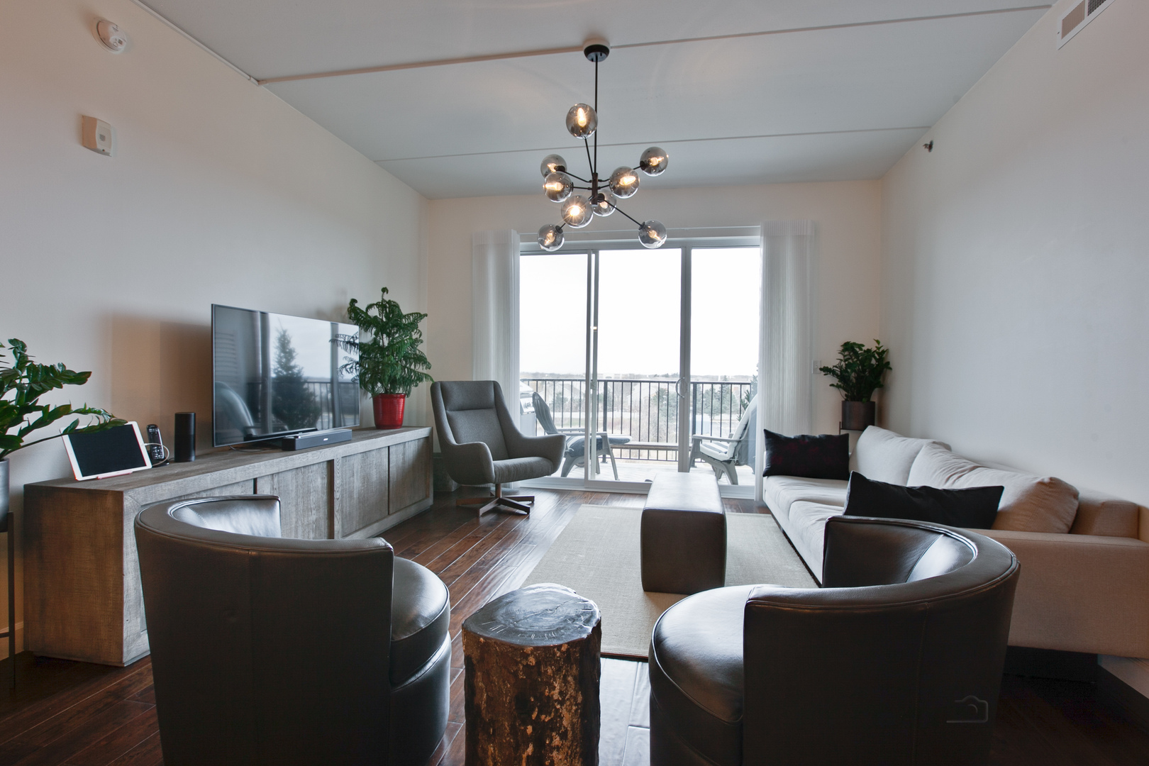 1199 East Port Clinton Road, Unit 405 Vernon Hills, IL 60061 - Photo 10 of 29 a living room with furniture and a large window