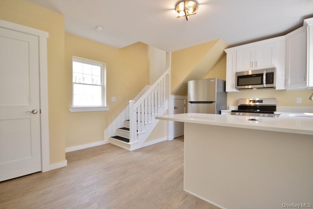 162 Rockland Road Roscoe, NY 12776 - Photo 20 of 36 a living room with furniture and a flat screen tv