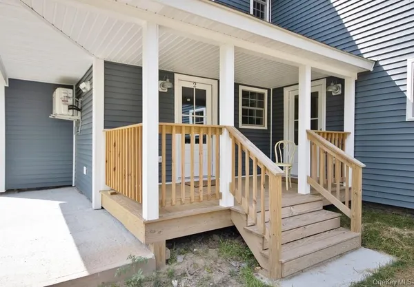 a view of front door and porch
