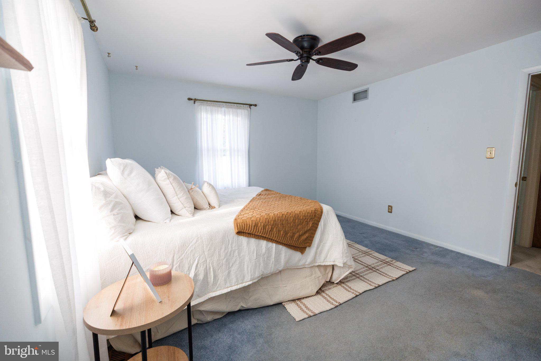 11307 Treeview Lane Monrovia, MD 21770 - Photo 20 of 63 a bedroom with a bed and a window