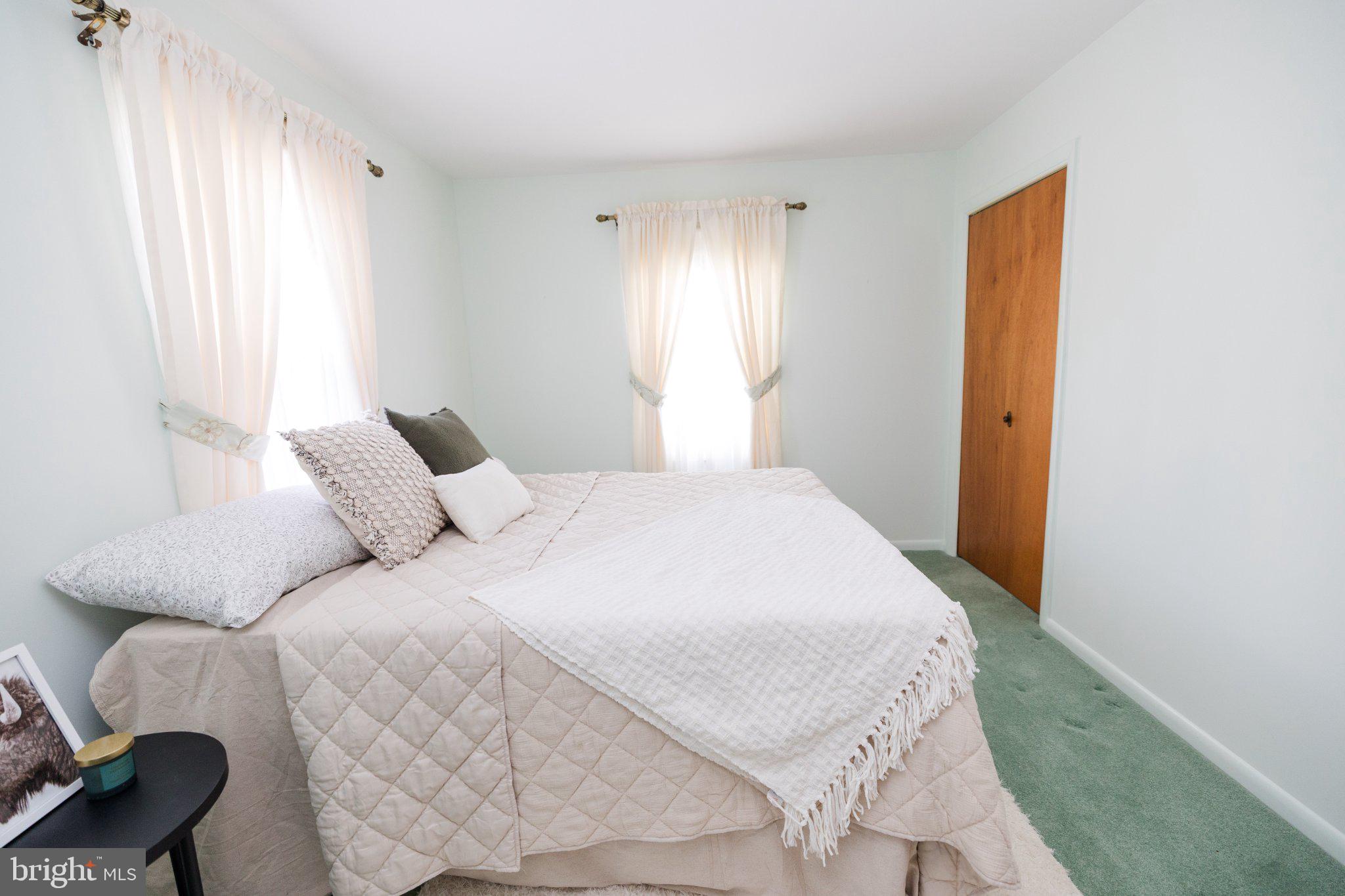 11307 Treeview Lane Monrovia, MD 21770 - Photo 26 of 63 a bedroom with a bed and a window