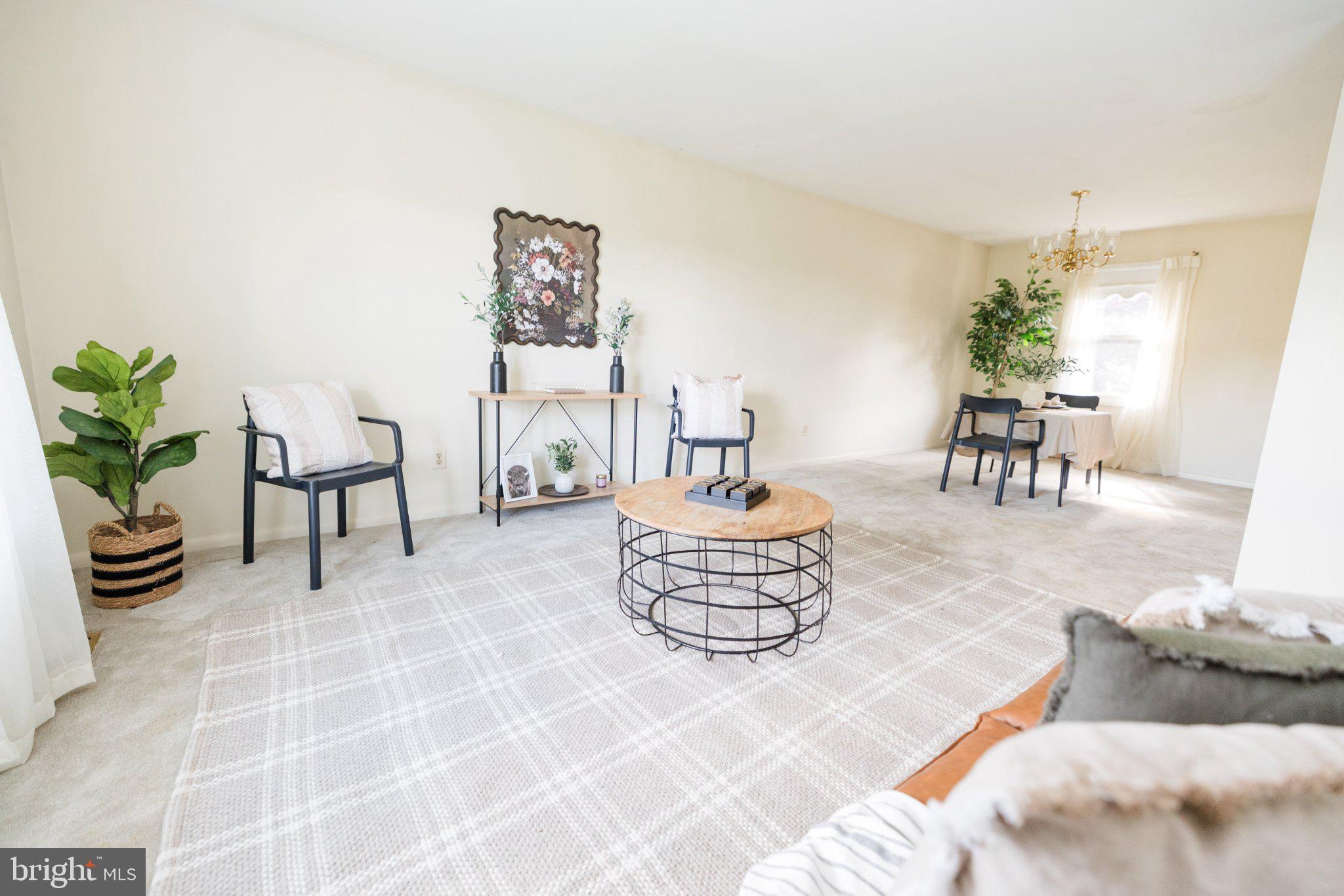 11307 Treeview Lane Monrovia, MD 21770 - Photo 4 of 63 a living room with furniture and a potted plant