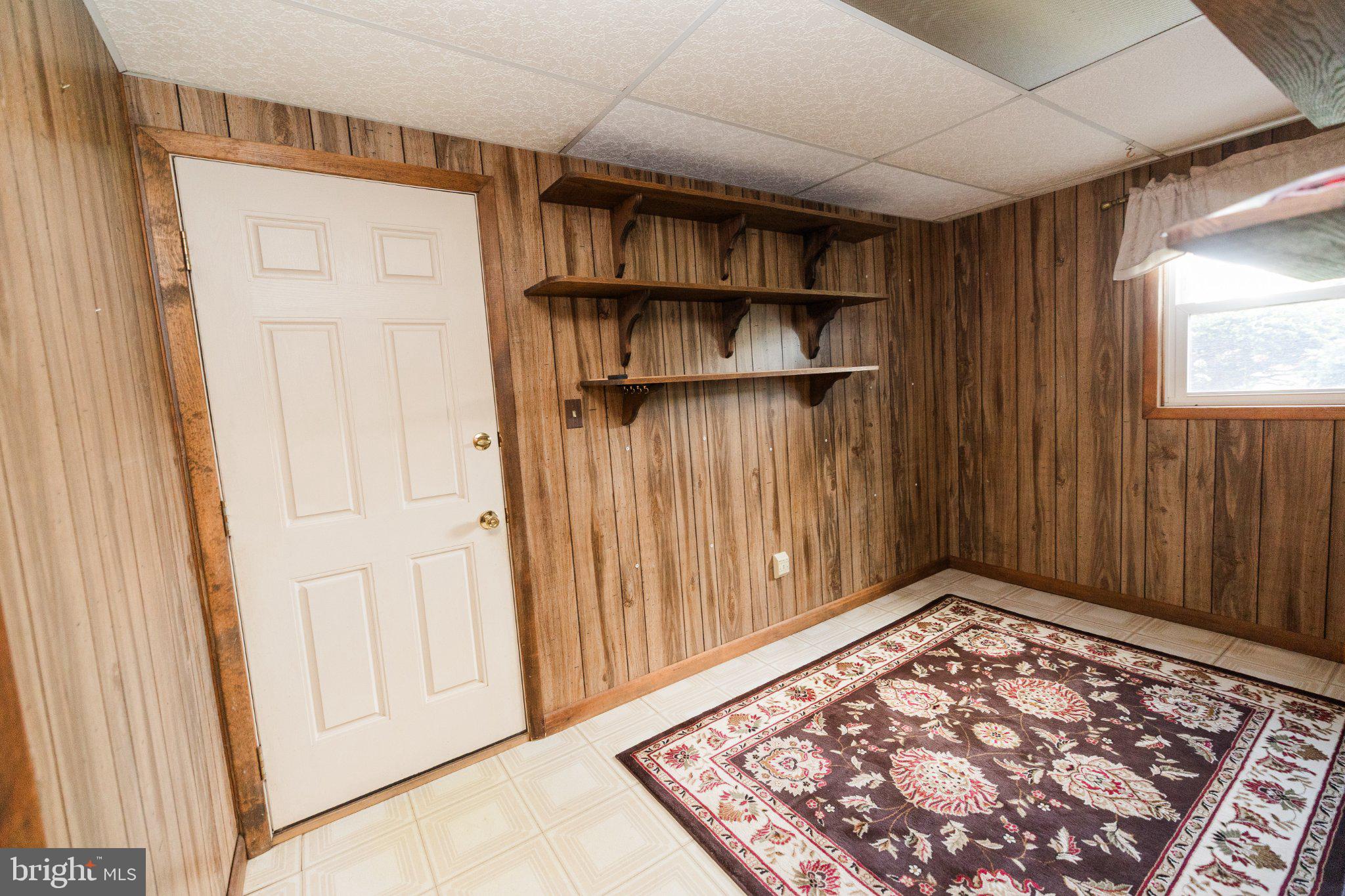 11307 Treeview Lane Monrovia, MD 21770 - Photo 42 of 63 a view of a hallway with wooden floor