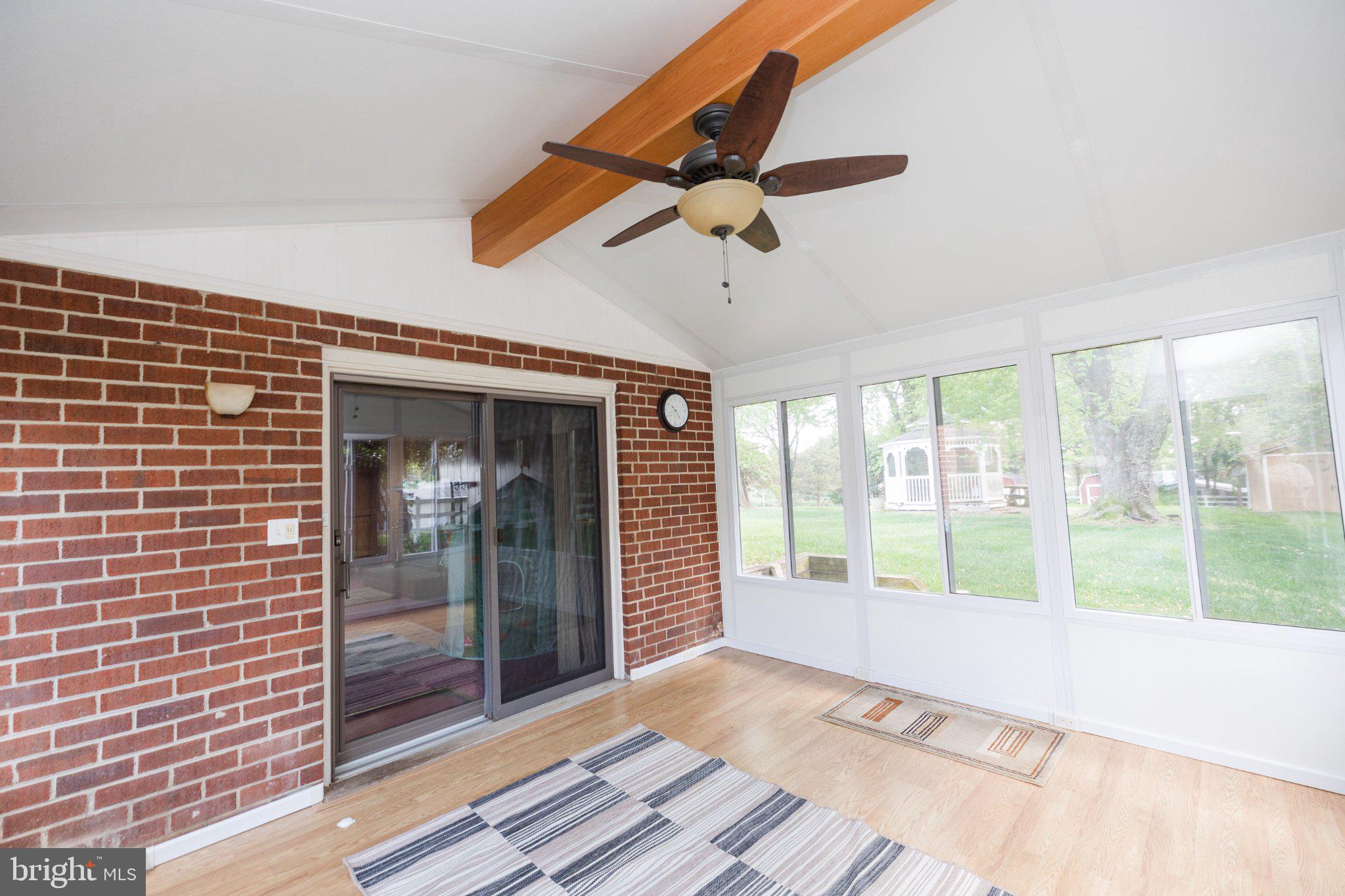 11307 Treeview Lane Monrovia, MD 21770 - Photo 50 of 63 a view of a room with a ceiling fan and window